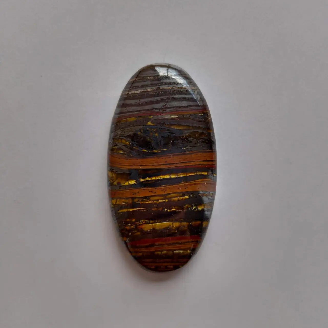 cabujon piedra ojo de tigre y hematite 10645