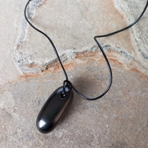 Dije en Piedra Natural Shungita Tamboreado Grande