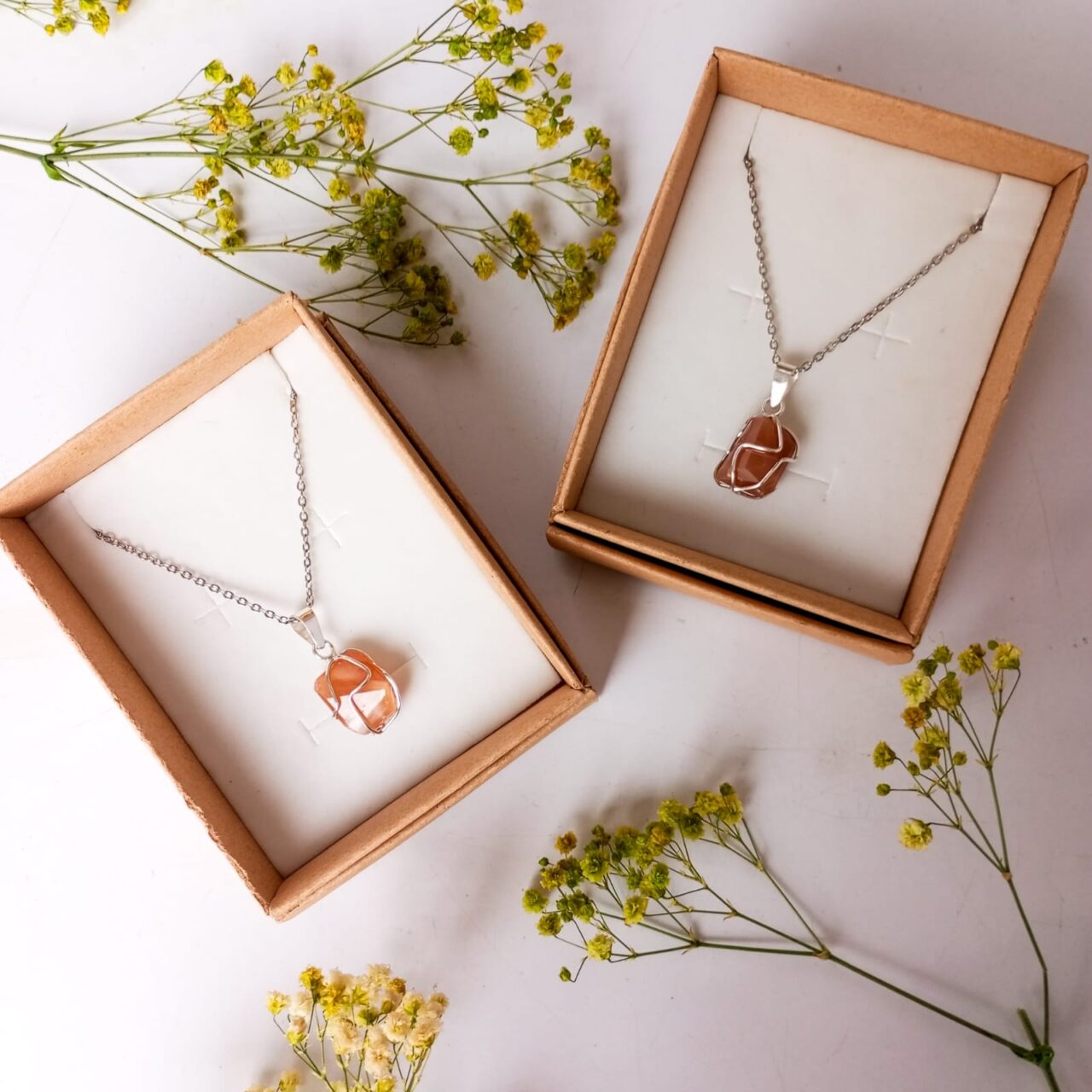 duo de dijes globo con piedra del sol duo 3 13560